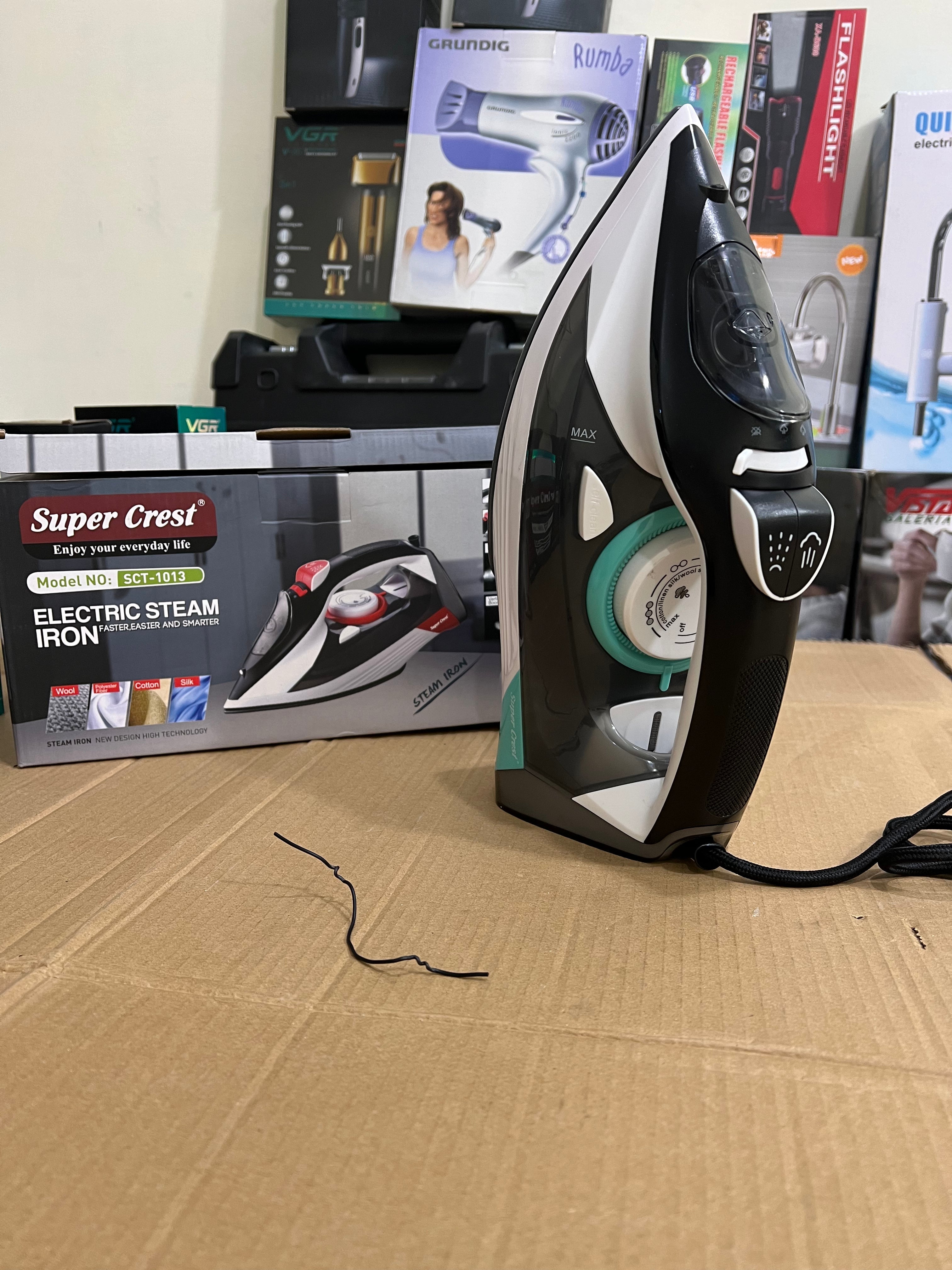 Lot imported super crest steam iron